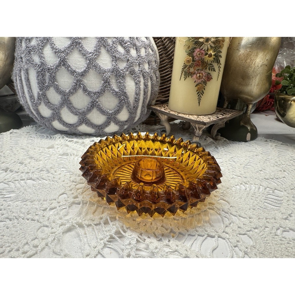 Amber glass candleholder with Diamond Point pattern by Indiana Glass.